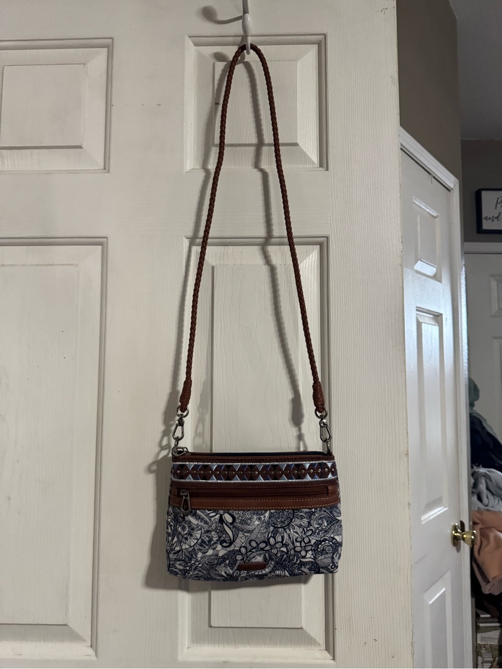 Sakroots Brown and Blue Floral Crossbody Sling